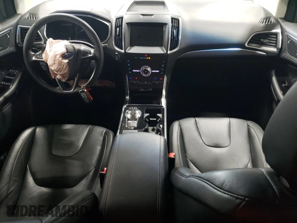 2020 Ford Edge Titanium z VIN 2FMPK4K9XLBA59857, wystawiony jako Copart lot #63559295 z przebiegiem Nie podano mil oraz Szkoda całkowita • Salvage title. Historia ofert i sprzedaży dostępna na DreamBid. Obrazek 8.