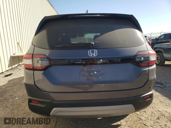 2024 Honda Pilot EX-L 7 Passenger with VIN 5FNYG2H58RB007819, listed as a Copart auction lot 77101344 with 2,829 mi miles and Salvage Title. Bid and sale history available at carsss.com. Image 6.