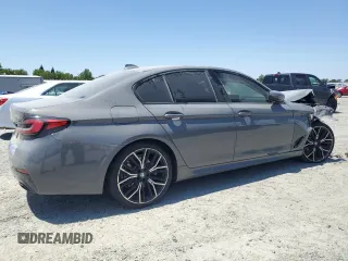 2021 BMW 5 Series 530e with VIN WBA13AG05MCF71415, listed as a Copart auction lot 58554935 with 9,994 mi miles and Clean title. Bid and sale history available at DreamBid. Image 3.
