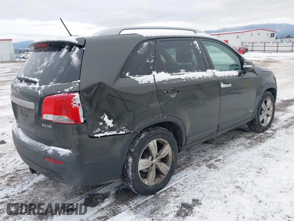 2012 Kia Sorento EX with VIN 5XYKUDA2XCG200628, listed as a IAAI auction lot 41495625 with 207,229 mi miles. Bid and sale history available at carsss.com. Image 4.
