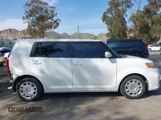 2015 Scion xB with VIN JTLZE4FE3FJ080193, listed as a IAAI auction lot 41976842 with 164,988 mi miles. Bid and sale history available at carsss.com. Image 14.