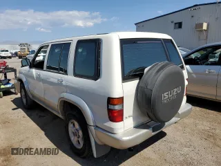 1999 Isuzu Trooper S z VIN JACDJ58X6X7912631, wystawiony jako Copart lot #74153604 z przebiegiem 141 037 mil mil oraz Szkoda całkowita • Salvage title. Historia ofert i sprzedaży dostępna na DreamBid. Obrazek 2.