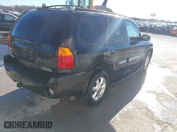 2005 GMC Envoy SLE z VIN 1GKDT13S952288760, wystawiony jako IAAI lot #41671656 z przebiegiem Nie podano mil oraz . Historia ofert i sprzedaży dostępna na DreamBid. Obrazek 4.
