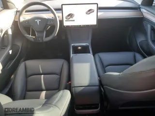 2023 Tesla Model 3 with VIN 5YJ3E1EAXPF704742, listed as a Copart auction lot 86323624 with 4,401 mi miles and Salvage Title. Bid and sale history available at carsss.com. Image 8.