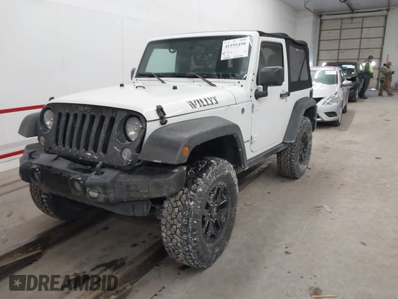 2016 Jeep Wrangler Sport with VIN 1C4AJWAG9GL261958, listed as a IAAI auction lot 41595490 with 32,433 mi miles and . Bid and sale history available at carsss.com. Image 17.