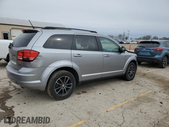 2017 Dodge Journey SE with VIN 3C4PDCAB9HT573188, listed as a Copart auction lot 51996425 with 121,978 mi miles and Salvage Title. Bid and sale history available at DreamBid. Image 3.
