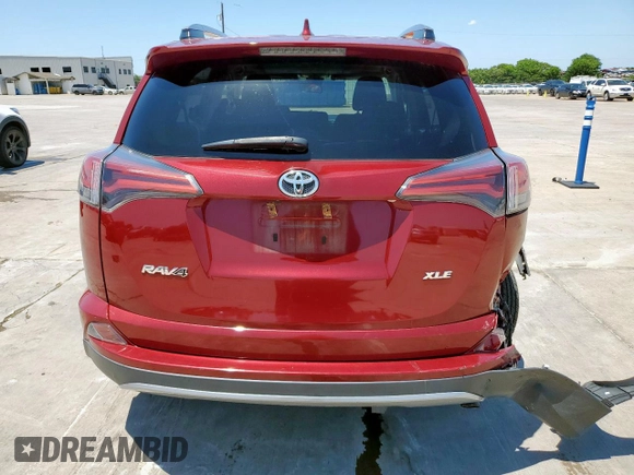 2018 Toyota RAV4 XLE with VIN 2T3WFREV0JW489613, listed as a Copart auction lot 61245005 with 46,253 mi miles and Salvage title. Bid and sale history available at DreamBid. Image 6.
