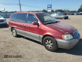 2003 Kia Sedona LX with VIN KNDUP131236411909, listed as a Copart auction lot 73715384 with 179,642 mi miles and Salvage Title. Bid and sale history available at carsss.com. Image 4.