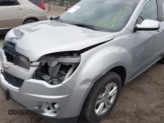 2015 Chevrolet Equinox LT z VIN 2GNFLFEK5F6341898, wystawiony jako IAAI lot #41953065 z przebiegiem 148 017 mil mil oraz . Historia ofert i sprzedaży dostępna na DreamBid. Obrazek 19.