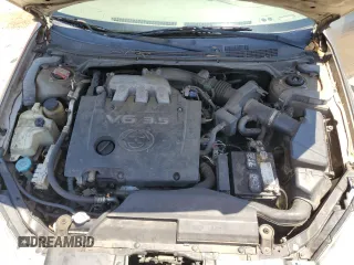 2005 Nissan Altima SE z VIN 1N4BL11D95N451242, wystawiony jako Copart lot #55942315 z przebiegiem 245 942 mil mil oraz Szkoda całkowita • Salvage title. Historia ofert i sprzedaży dostępna na DreamBid. Obrazek 11.