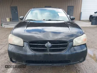 2001 Nissan Maxima SE z VIN JN1CA31D71T834010, wystawiony jako IAAI lot #42317556 z przebiegiem 193 494 mil mil oraz . Historia ofert i sprzedaży dostępna na DreamBid. Obrazek 6.