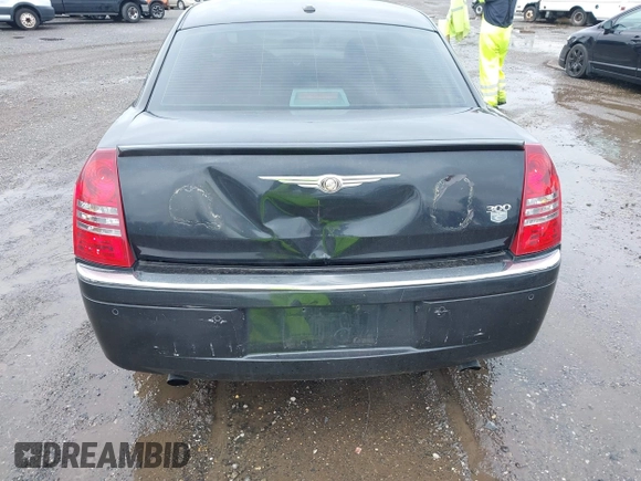 2006 Chrysler 300 C z VIN 2C3LA63H66H412270, wystawiony jako IAAI lot #42479868 z przebiegiem 143 476 mil mil oraz . Historia ofert i sprzedaży dostępna na DreamBid. Obrazek 6.