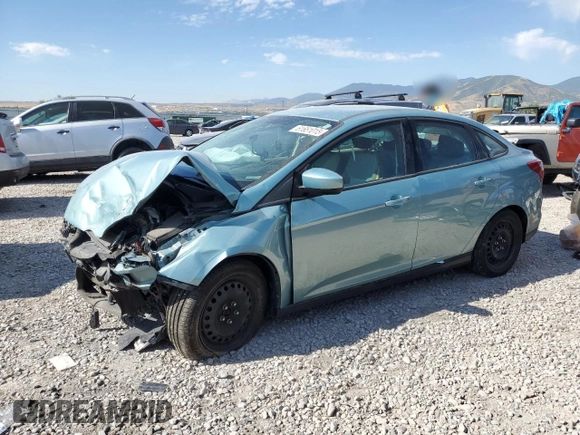 2012 Ford Focus SE with VIN 1FAHP3F24CL163896, listed as a Copart auction lot 61651015 with Not provided miles and Salvage title. Bid and sale history available at DreamBid. Image 1.