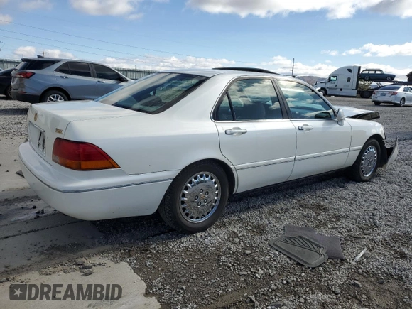 1997 Acura RL Premium Pkg with VIN JH4KA9655VC005115, listed as a Copart auction lot 48745265 with 0 mi miles and Salvage Title. Bid and sale history available at carsss.com. Image 3.