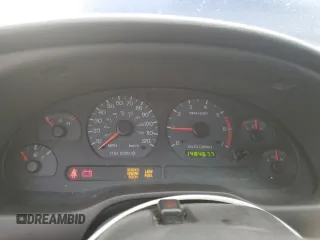 2004 Ford Mustang Deluxe with VIN 1FAFP444X4F107575, listed as a Copart auction lot 60908705 with 148,467 mi miles and Salvage title. Bid and sale history available at DreamBid. Image 9.