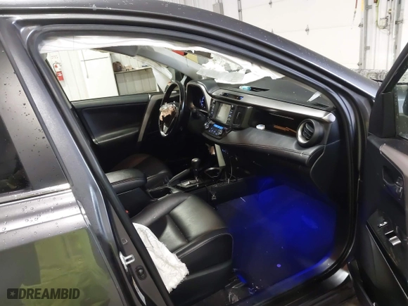 2018 Toyota RAV4 Limited with VIN JTMDFREV7JJ212799, listed as a IAAI auction lot 41202854 with 120,705 mi miles. Bid and sale history available at carsss.com. Image 5.