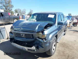 2006 Honda Ridgeline RTS z VIN 2HJYK16446H557197, wystawiony jako IAAI lot #42227895 z przebiegiem 285 603 mil mil oraz . Historia ofert i sprzedaży dostępna na DreamBid. Obrazek 2.