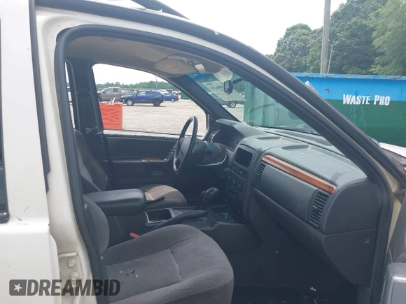 1999 Jeep Grand Cherokee Laredo with VIN 1J4GW58S3XC505985, listed as a IAAI auction lot 42399619 with 253,876 mi miles and . Bid and sale history available at DreamBid. Image 5.