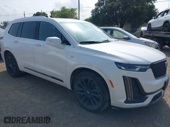 2022 Cadillac XT6 Premium Luxury with VIN 1GYKPCRS2NZ127050, listed as a IAAI auction lot 42072418 with 31,165 mi miles and . Bid and sale history available at DreamBid. Image 1.