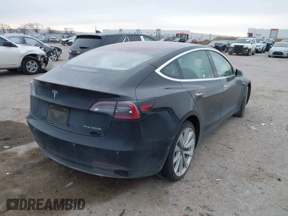 2018 Tesla Model 3 Long Range Battery with VIN 5YJ3E1EB9JF188437, listed as a IAAI auction lot 41371254 with 55,934 mi miles and . Bid and sale history available at DreamBid. Image 4.