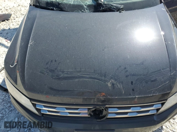 2018 Volkswagen Tiguan S z VIN 3VV1B7AX6JM147216, wystawiony jako Copart lot #52449345 z przebiegiem Nie podano mil oraz Szkoda całkowita • Salvage title. Historia ofert i sprzedaży dostępna na DreamBid. Obrazek 11.