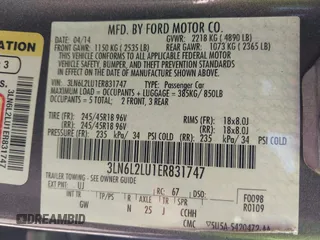 2014 Lincoln MKZ Hybrid z VIN 3LN6L2LU1ER831747, wystawiony jako IAAI lot #42053619 z przebiegiem 137 062 mil mil oraz . Historia ofert i sprzedaży dostępna na DreamBid. Obrazek 9.