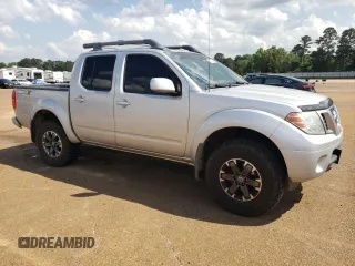2016 Nissan Frontier Pro-4X with VIN 1N6AD0EV0GN797437, listed as a Copart auction lot 54203245 with 131,021 mi miles and Salvage title. Bid and sale history available at DreamBid. Image 4.