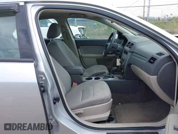 2012 Ford Fusion S with VIN 3FAHP0GA3CR127140, listed as a IAAI auction lot 42127986 with 83,447 mi miles and . Bid and sale history available at carsss.com. Image 5.