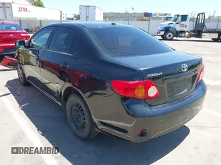 2010 Toyota Corolla with VIN 1NXBU4EE3AZ307385, listed as a IAAI auction lot 42465219 with 201,105 mi miles and . Bid and sale history available at DreamBid. Image 3.