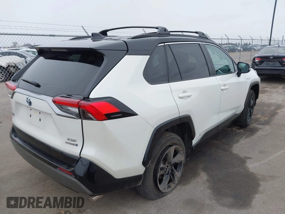 2021 Toyota RAV4 Hybrid XSE with VIN 2T3E6RFV4MW021009, listed as a IAAI auction lot 41940278 with 33,016 mi miles and . Bid and sale history available at DreamBid. Image 4.