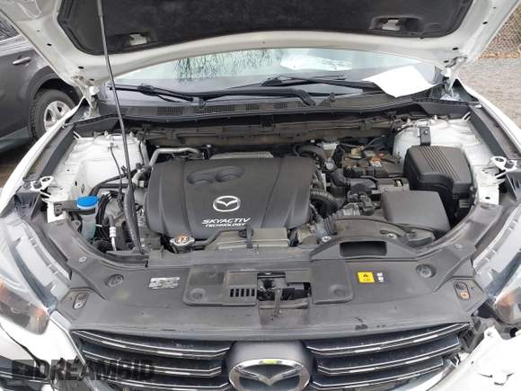 2016 Mazda CX-5 Grand Touring with VIN JM3KE4DY3G0838204, listed as a IAAI auction lot 41961049 with 98,918 mi miles and . Bid and sale history available at carsss.com. Image 10.