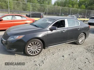 2014 Lincoln MKS with VIN 1LNHL9EK2EG610291, listed as a Copart auction lot 54544745 with 147,075 mi miles and Salvage Title. Bid and sale history available at carsss.com. Image 1.