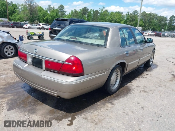 2001 Mercury Grand Marquis LS z VIN 2MEFM75W31X704182, wystawiony jako IAAI lot #42086175 z przebiegiem 177 892 mil mil oraz . Historia ofert i sprzedaży dostępna na DreamBid. Obrazek 4.