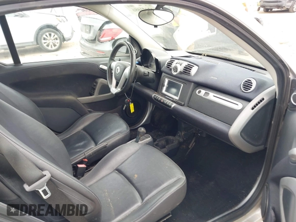 2013 Smart fortwo Pure with VIN WMEEJ3BA5DK620493, listed as a IAAI auction lot 42071086 with 85,883 mi miles and . Bid and sale history available at DreamBid. Image 5.