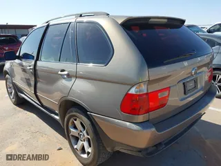 2005 BMW X5 3.0i with VIN 5UXFA13585LY02191, listed as a IAAI auction lot 41972273 with 179,816 mi miles. Bid and sale history available at carsss.com. Image 3.