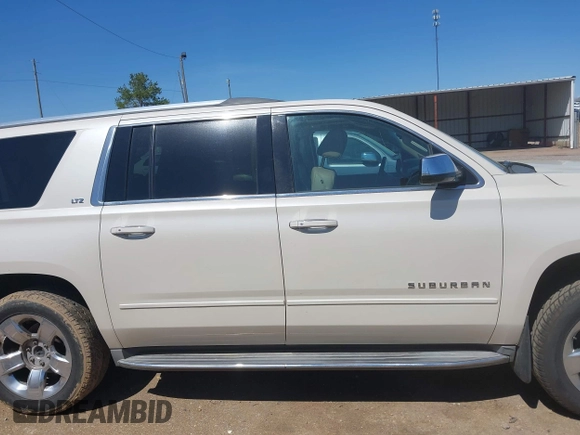 2015 Chevrolet Suburban LTZ with VIN 1GNSCKKC3FR113388, listed as a IAAI auction lot 41867964 with 238,530 mi miles and . Bid and sale history available at DreamBid. Image 14.