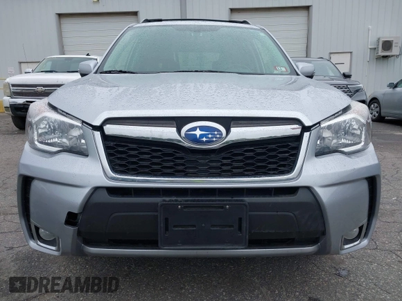 2014 Subaru Forester XT Touring with VIN JF2SJGMC1EH552474, listed as a IAAI auction lot 42461663 with 121,482 mi miles and . Bid and sale history available at DreamBid. Image 6.