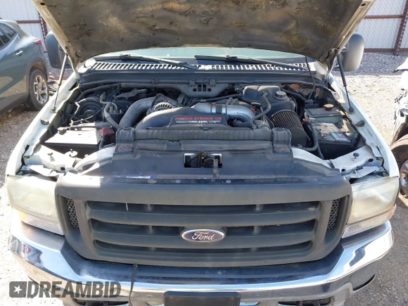 2003 Ford F-350 XL z VIN 1FTSW31P43EC84132, wystawiony jako IAAI lot #41940181 z przebiegiem 317 688 mil mil oraz . Historia ofert i sprzedaży dostępna na DreamBid. Obrazek 10.