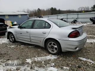 2001 Pontiac Grand Am GT1 with VIN 1G2NV52E31C236580, listed as a Copart auction lot 83085894 with 114,381 mi miles and Salvage Title. Bid and sale history available at carsss.com. Image 2.