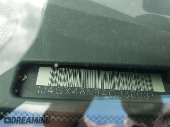 2004 Jeep Grand Cherokee Laredo z VIN 1J4GX48N94C386031, wystawiony jako Copart lot #55804755 z przebiegiem 160 103 mil mil oraz Szkoda całkowita • Salvage title. Historia ofert i sprzedaży dostępna na DreamBid. Obrazek 13.