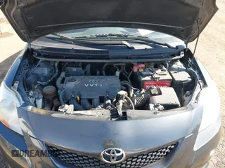 2009 Toyota Yaris with VIN JTDBT903194047784, listed as a IAAI auction lot 42049872 with 115,735 mi miles. Bid and sale history available at carsss.com. Image 10.