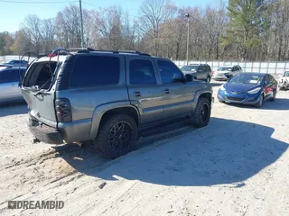 2002 Chevrolet Tahoe LT with VIN 1GNEK13Z22J279570, listed as a IAAI auction lot 41858543 with 378,318 mi miles. Bid and sale history available at carsss.com. Image 4.