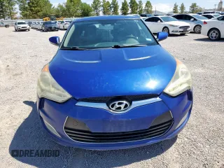 2013 Hyundai Veloster w/Red Int with VIN KMHTC6AD2DU150842, listed as a Copart auction lot 66378455 with 119,901 mi miles and Clean title. Bid and sale history available at DreamBid. Image 5.