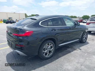 2024 BMW X4 xDrive30i z VIN 5UX33DT09R9W67695, wystawiony jako IAAI lot #42087562 z przebiegiem 20 324 mil mil oraz . Historia ofert i sprzedaży dostępna na DreamBid. Obrazek 4.