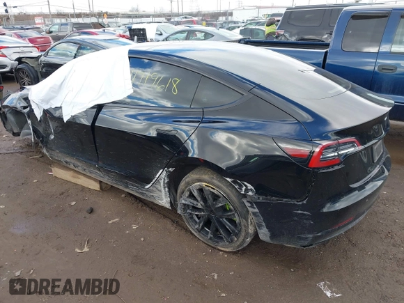 2023 Tesla Model 3 z VIN 5YJ3E1EA1PF512562, wystawiony jako IAAI lot #41719618 z przebiegiem 43 612 mil mil oraz . Historia ofert i sprzedaży dostępna na DreamBid. Obrazek 3.