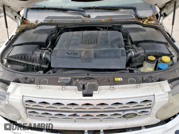 2012 Land Rover LR4 Lux z VIN SALAK2D49CA641498, wystawiony jako Copart lot #57648475 z przebiegiem 158 538 mil mil oraz Szkoda całkowita • Salvage title. Historia ofert i sprzedaży dostępna na DreamBid. Obrazek 11.