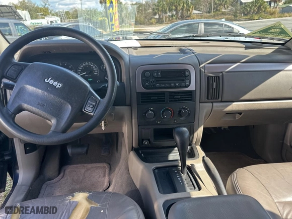 2004 Jeep Grand Cherokee Laredo with VIN 1J4GX48N24C436753, listed as a Copart auction lot 45039845 with 114,024 mi miles and Clean Title. Bid and sale history available at carsss.com. Image 9.