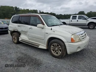 2005 Suzuki XL7 LX z VIN JS3TX92V254105078, wystawiony jako Copart lot #69820194 z przebiegiem 224 805 mil mil oraz Szkoda całkowita • Salvage title. Historia ofert i sprzedaży dostępna na DreamBid. Obrazek 4.