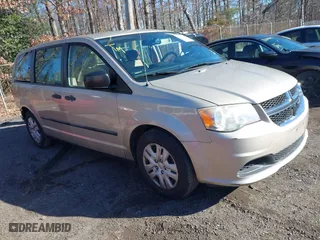 2014 Dodge Grand Caravan SE with VIN 2C4RDGBG3ER452732, listed as a IAAI auction lot 41213062 with 105,379 mi miles. Bid and sale history available at carsss.com. Image 1.