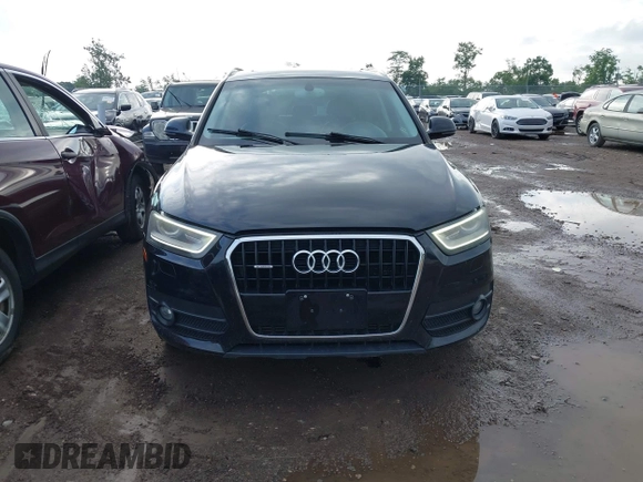 2015 Audi Q3 Premium Plus z VIN WA1EFCFS6FR001473, wystawiony jako IAAI lot #42795951 z przebiegiem 148 638 mil mil oraz . Historia ofert i sprzedaży dostępna na DreamBid. Obrazek 12.